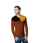 Stylish man wearing a mens multicolour long sleeve tshirt featuring bold color blocking in black, yellow, and brown.
